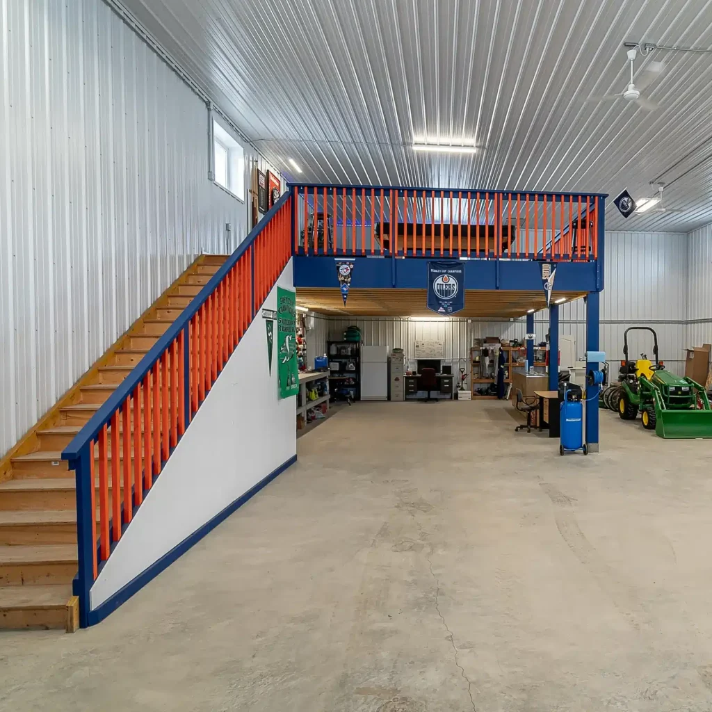 An ascot grey post-frame lifestyle & Hobby shop with an overhead door