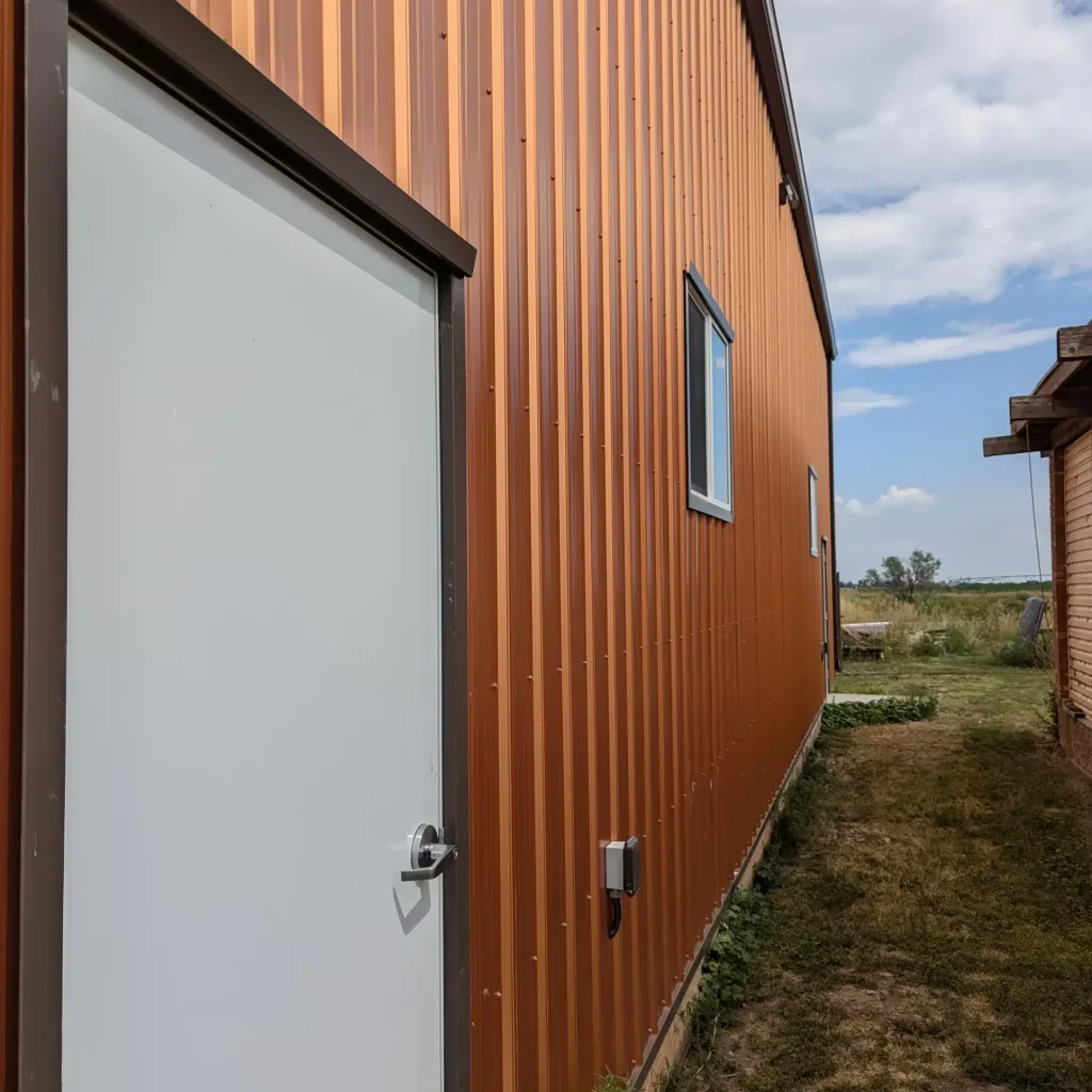 A copper penny post-frame agriculture storage building