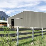 A sable post-frame commercial riding arena