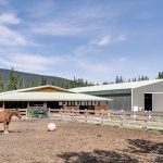 A sable post-frame commercial riding arena