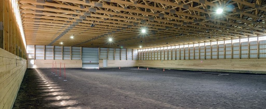 A sable post-frame commercial riding arena