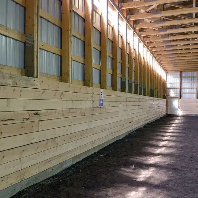 A sable post-frame commercial riding arena