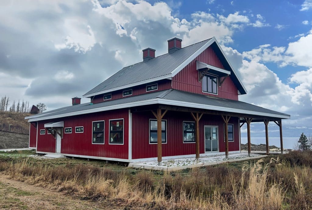 Red Barndominium built by Integrity Post Structures