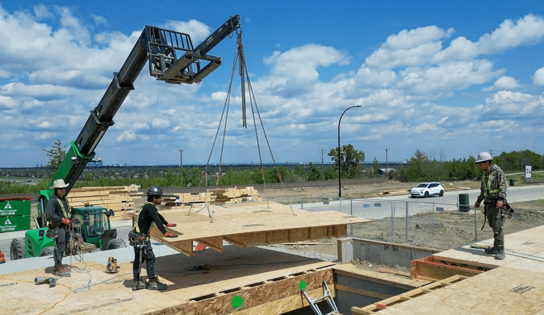 Integrity Building Products Supply and Install crew is framing a building in Calgary following the safety protocols.