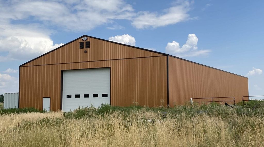 A copper penny post-frame agriculture storage building