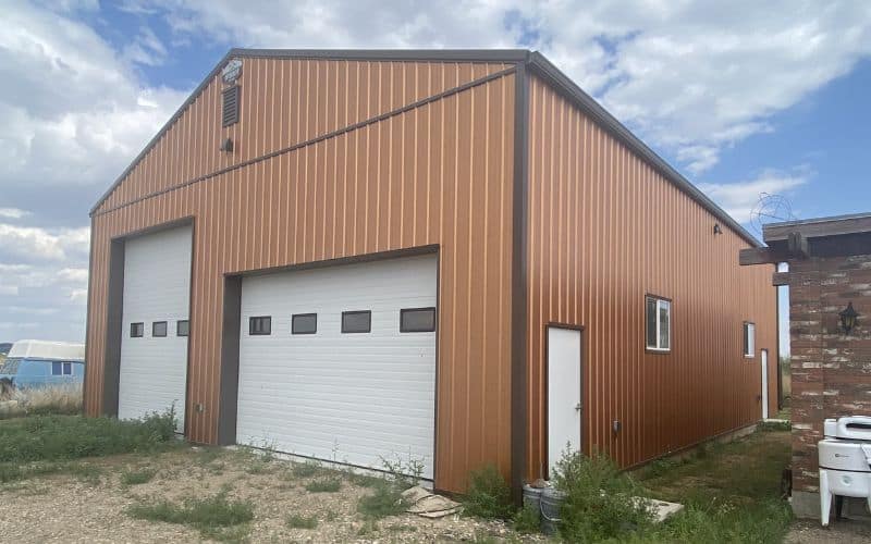 A copper penny post-frame agriculture storage building