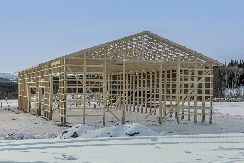 Quality building materials - post-frame shop under construction
