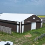 Explore the custom barn and livestock shelter built for Bryan of Wilbar Cattle Co near Dundurn, SK. Engineered for cattle protection and heavy prairie weather.