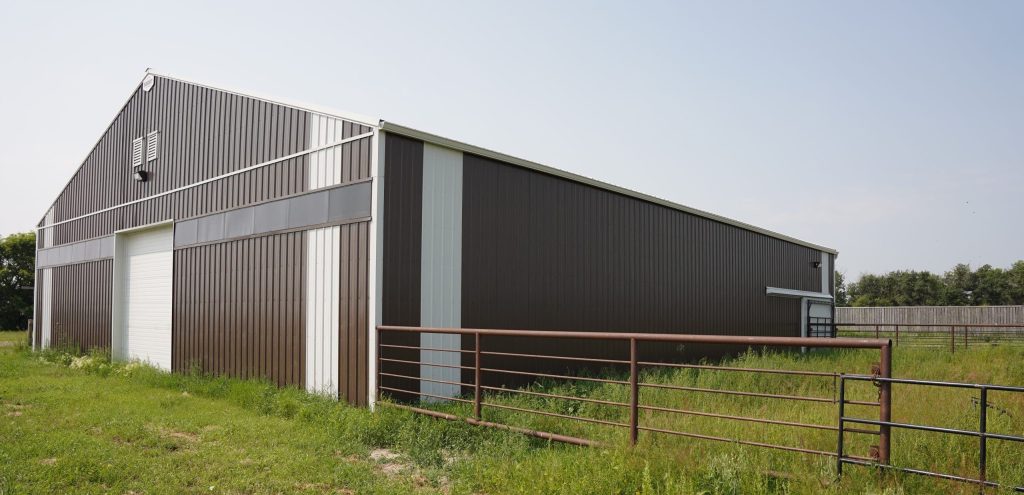Explore the custom barn and livestock shelter built for Bryan of Wilbar Cattle Co near Dundurn, SK. Engineered for cattle protection and heavy prairie weather.