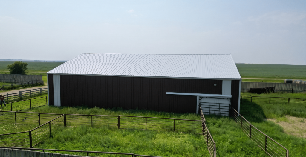 Explore the custom barn and livestock shelter built for Bryan of Wilbar Cattle Co near Dundurn, SK. Engineered for cattle protection and heavy prairie weather.
