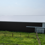 Explore the custom barn and livestock shelter built for Bryan of Wilbar Cattle Co near Dundurn, SK. Engineered for cattle protection and heavy prairie weather.