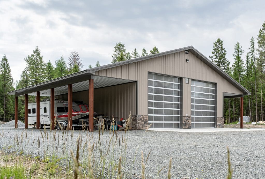 Post-frame shop with two open lean-tos built by Integrity Post Structures