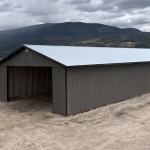 A charcoal post-frame agriculture storage building