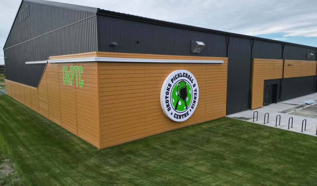 A Iron Ore post-frame Commercial Pickleball community association with premium Autumn