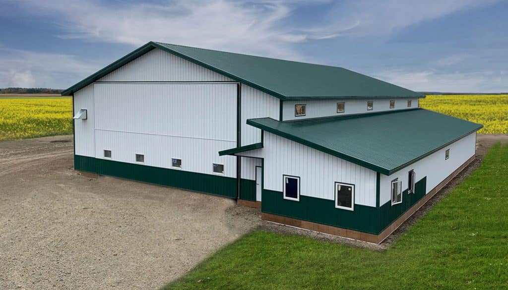 Post-frame ag machine shed with an office space built by Integrity Post Structures