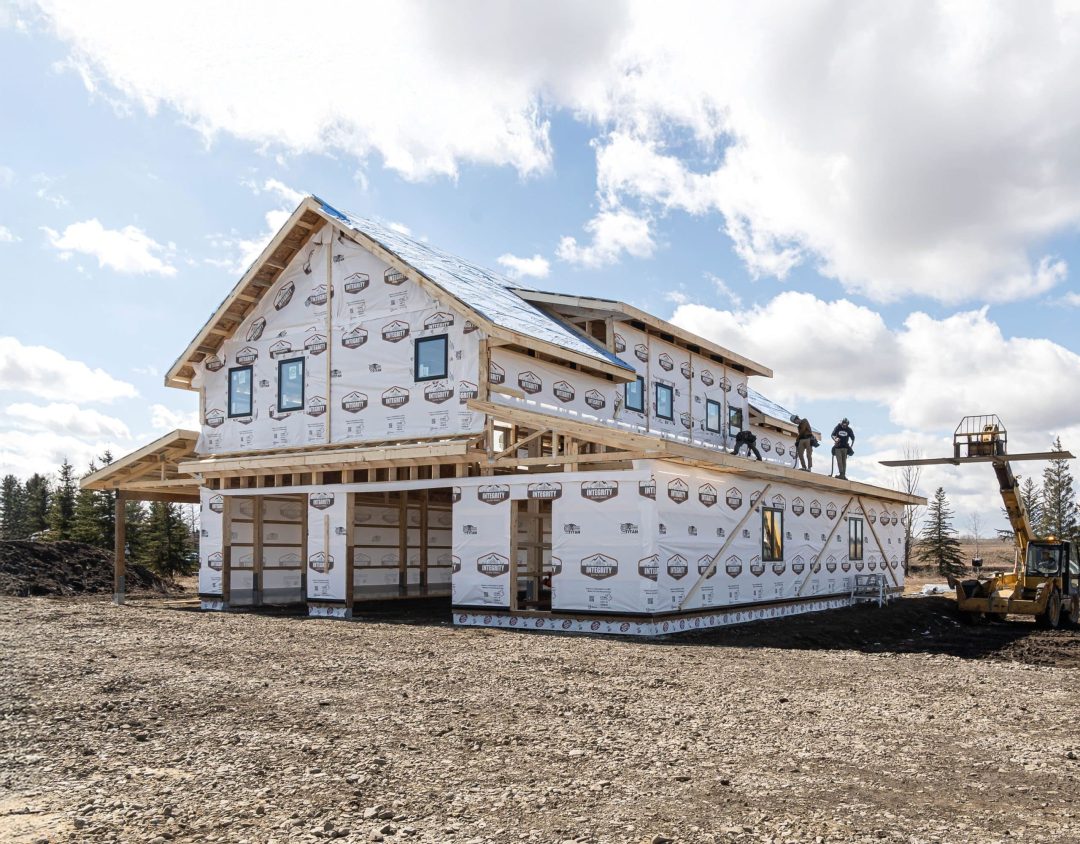 Post-frame custom residential homes by Integrity Post Structures - Carriage House under construction
