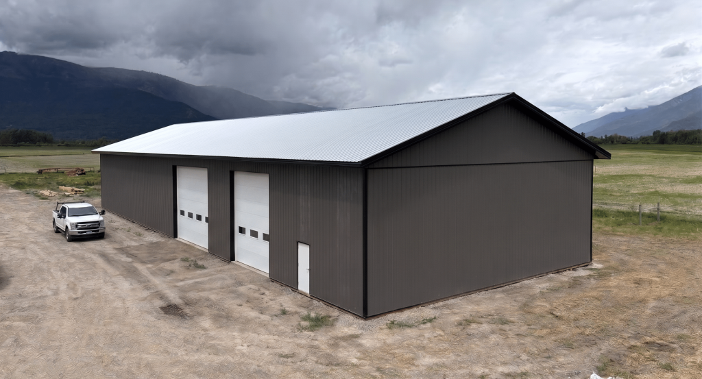 A charcoal post-frame agriculture storage building