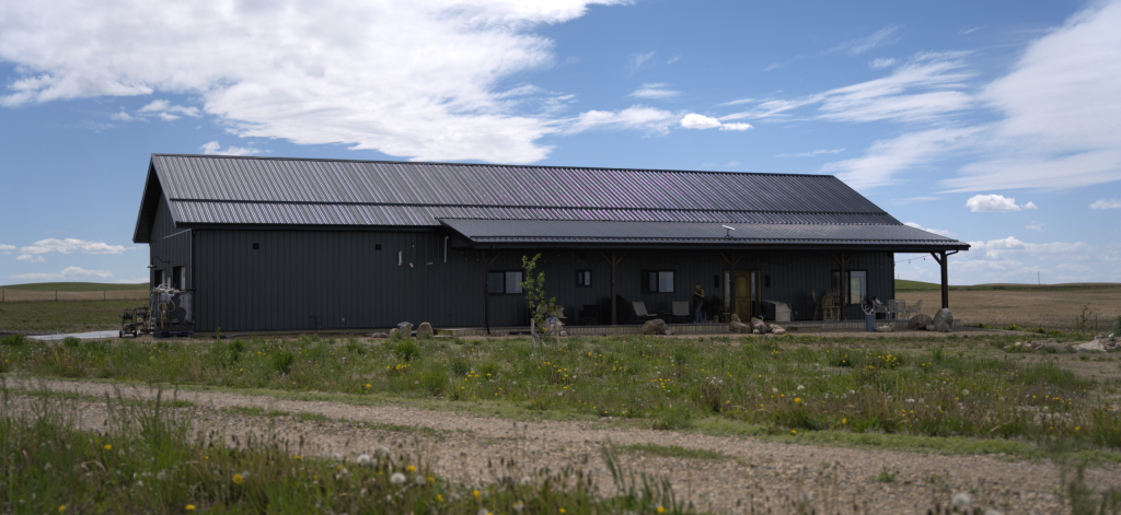 A gunmetal post-frame residential Ranch Hand