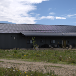 A gunmetal post-frame residential Ranch Hand
