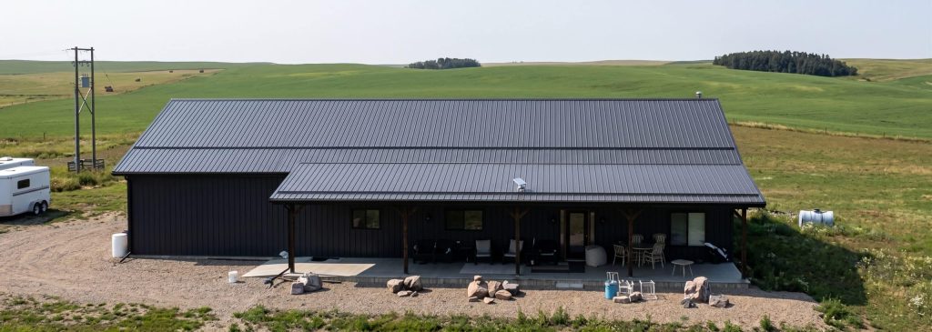 A gunmetal post-frame residential Ranch Hand