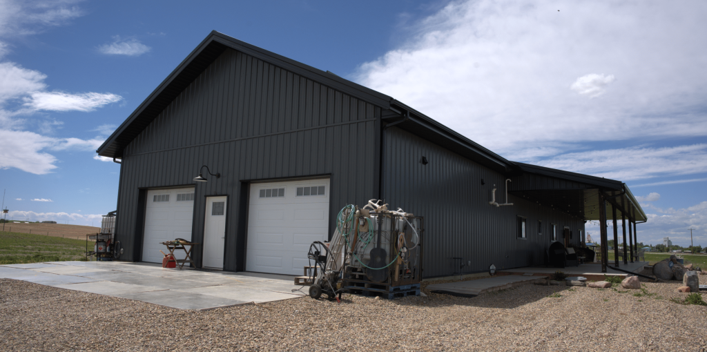 A gunmetal post-frame residential Ranch Hand