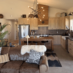 A gunmetal post-frame residential Ranch Hand
