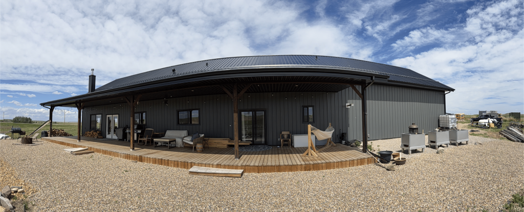 A gunmetal post-frame residential Ranch Hand