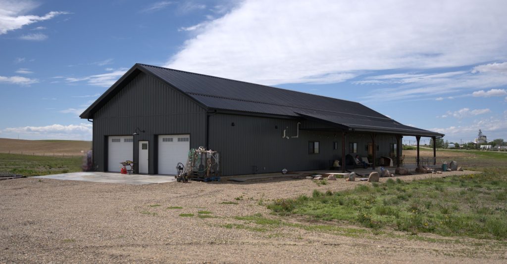 A gunmetal post-frame residential Ranch Hand