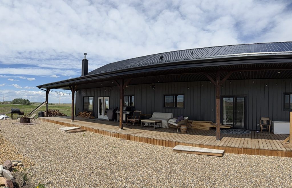 A gunmetal post-frame residential Ranch Hand
