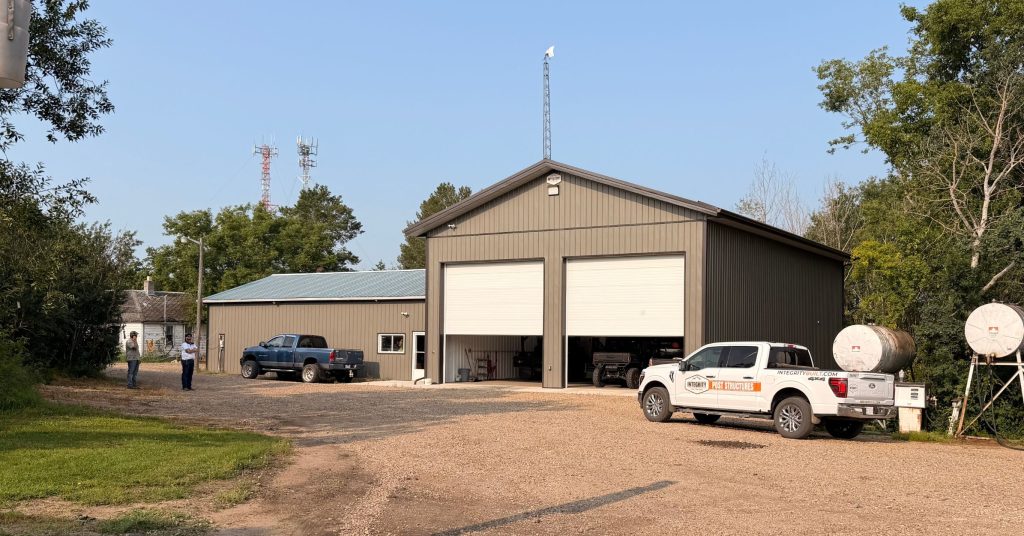 A Sable custom post-frame storage building with overhead doors