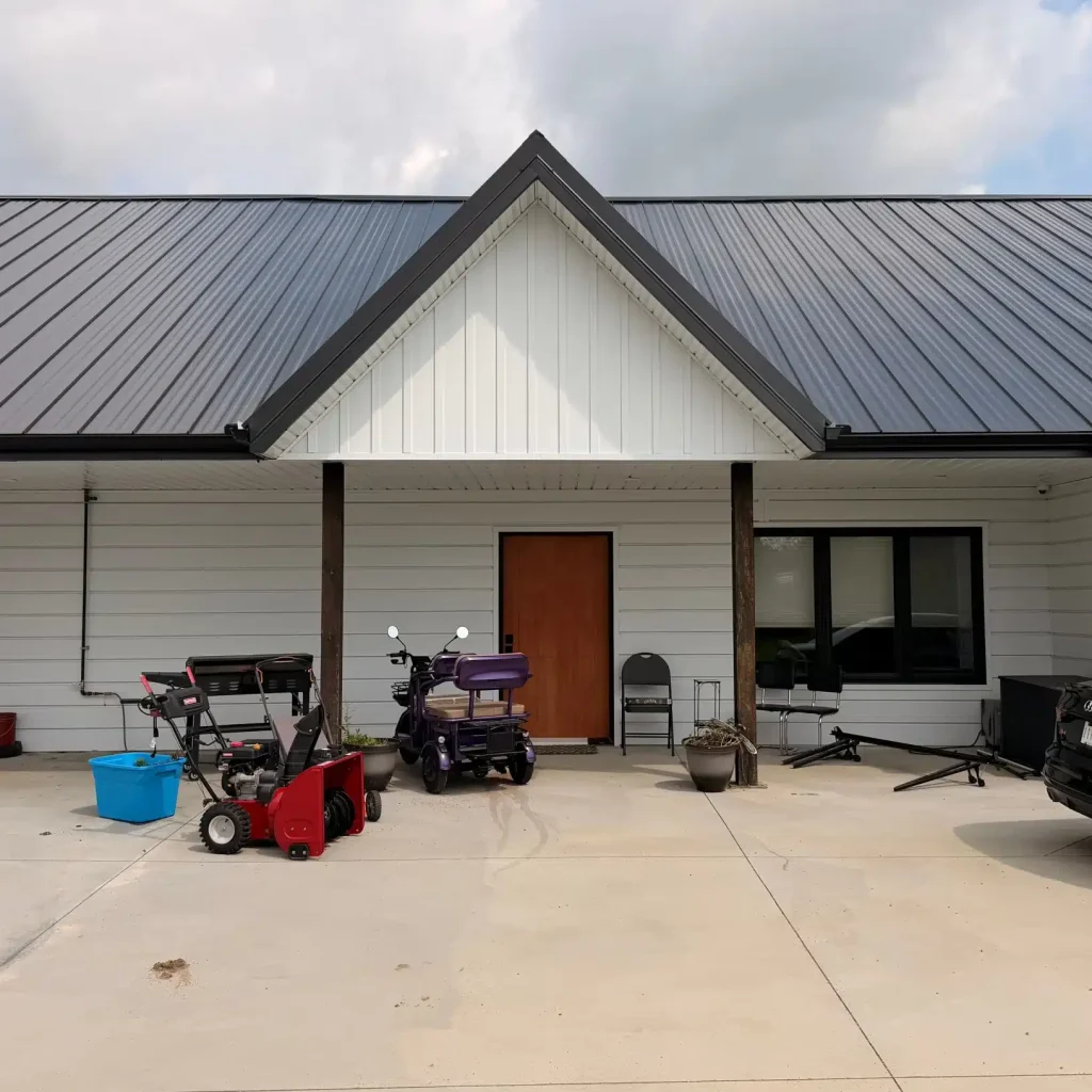 Explore the custom Homestead with loft built for Tyler near Kindersley, SK. Features upgraded Board and Batten Bright White siding and a functional, high-capacity design.