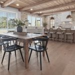 A dark brown custom post-frame residential home