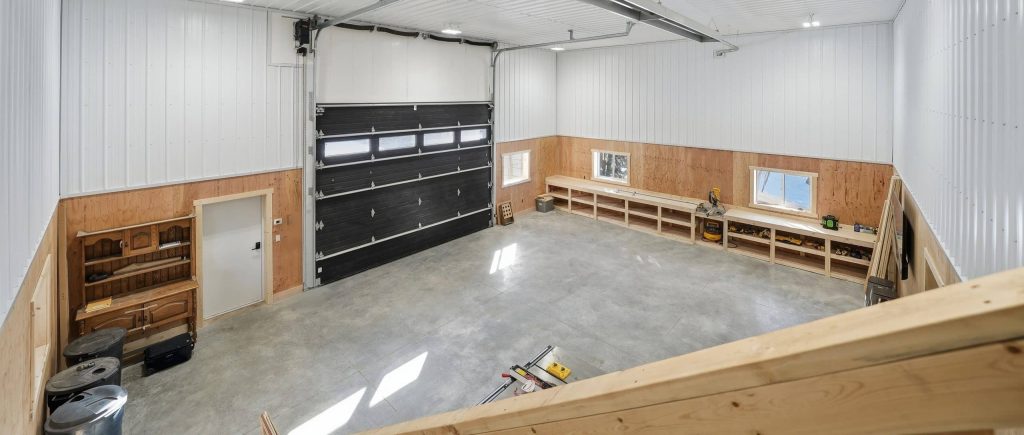 A dark brown lifestyle shop with an open lean-to and awnings