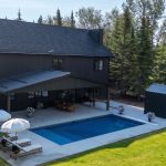 A dark brown custom post-frame residential home