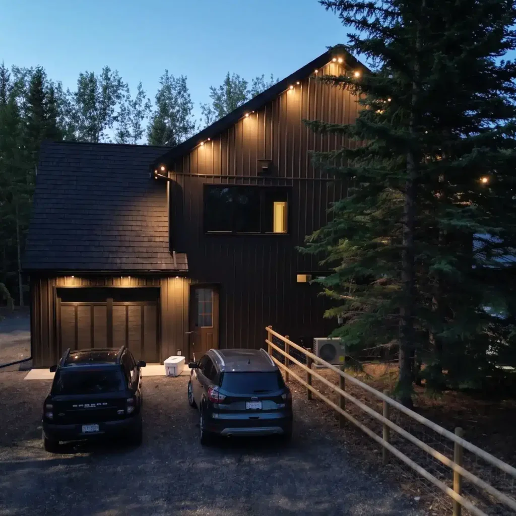 A dark brown custom post-frame residential home