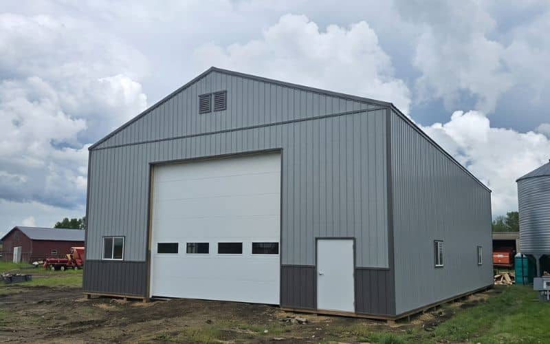 A Regent Grey post-frame agriculture shop with wainscoting