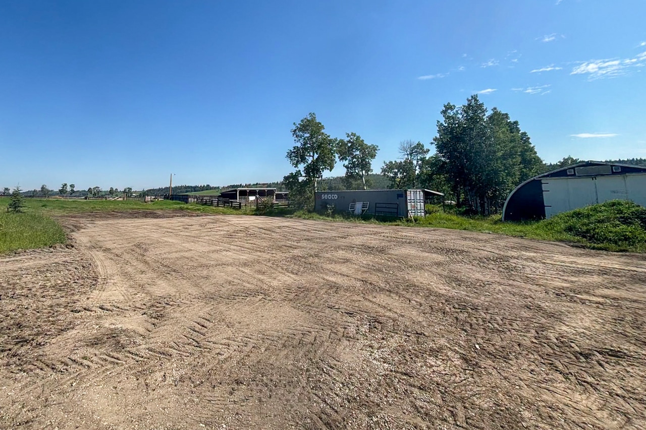 A prepped pad for a residential post-frame building