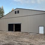 A sea wolf agriculture post-frame storage building with two sliding doors