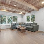 A black post-frame guest house