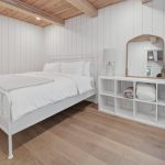 A black post-frame guest house