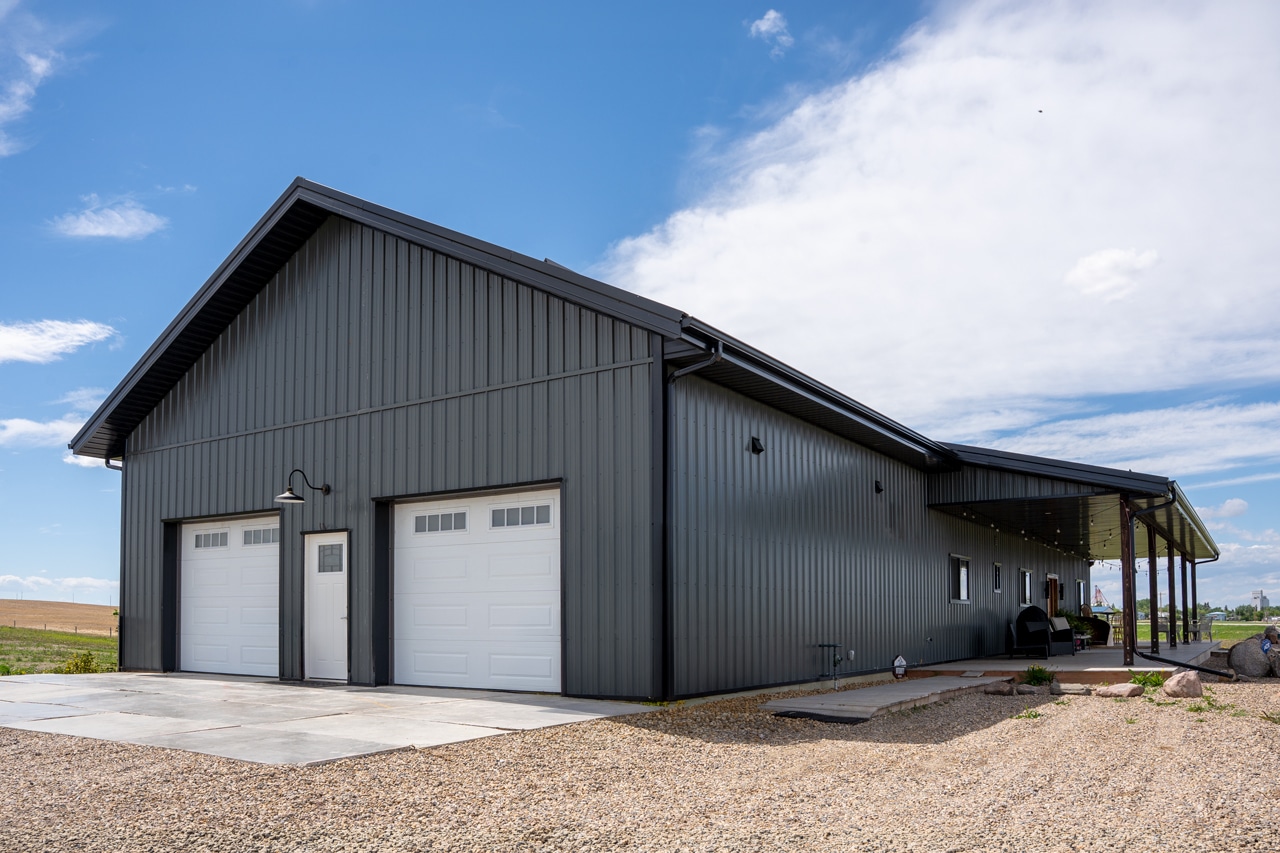 Ranch Hand with two porches and a garage built by Integrity post Structures