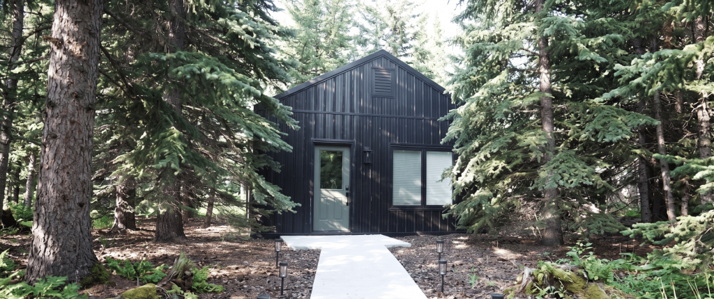 A black post-frame guest house