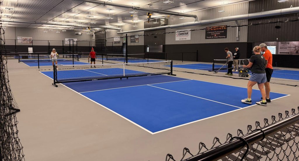 A Iron Ore post-frame Commercial Pickleball community association with premium Autumn