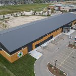 A Iron Ore post-frame Commercial Pickleball community association with premium Autumn