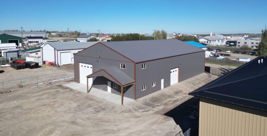 A charcoal agriculture and commercial post-frame storage shop with copper penny trims