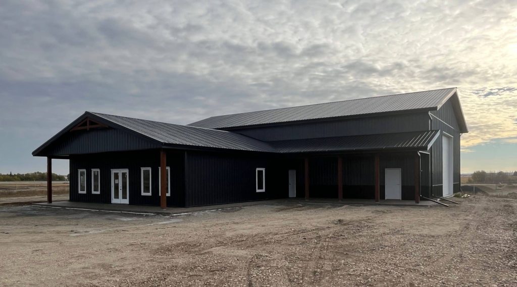 A post-frame commercial office and storage shop with wainscoting